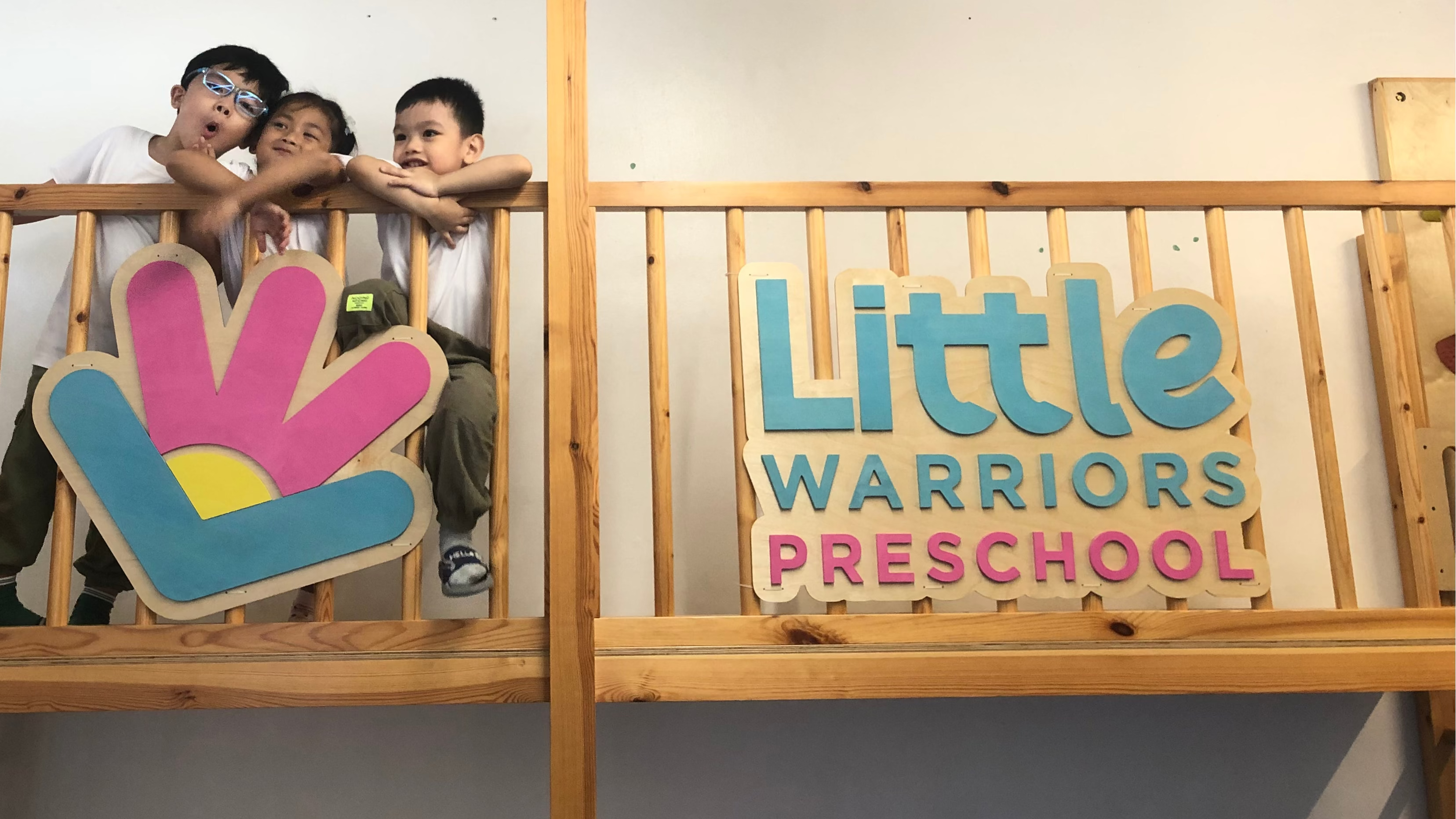 Children/Students of Little Warriors Preschool pose at the playground.